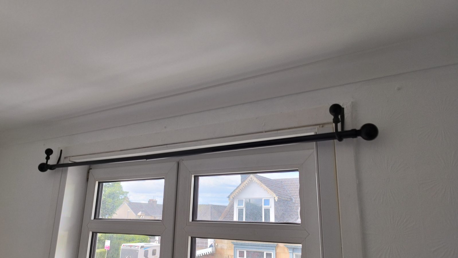Curtain rail fitted